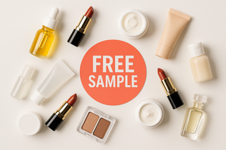 flatlay of a bunch of mini beauty products and a offer sticker on top with words 'Free Sample'